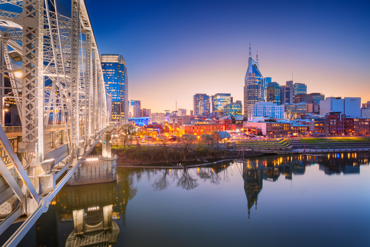 Nashville travel guide featuring downtown skyline and Broadway nightlife