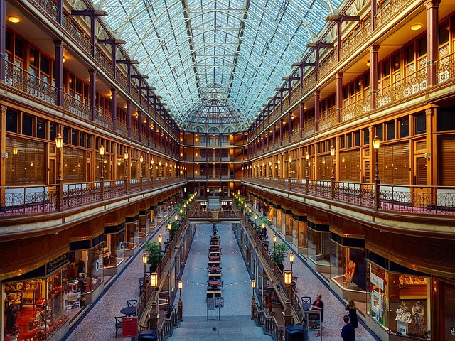 Cleveland travel guide image of the historic Arcade in downtown Cleveland with glass ceiling, shops, and ornate balconies